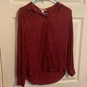 Red print H&M medium size button down shirt with 70s vibe pattern.